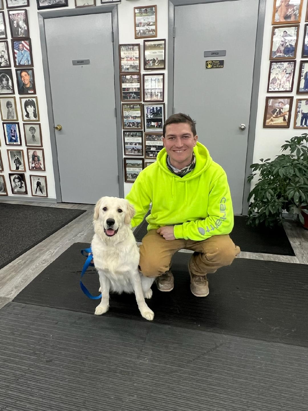 Testimonials 12 - Dog owner with well-behaved dog after board and train program